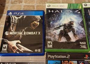 lot 107 image: XBOX and PlayStation Games