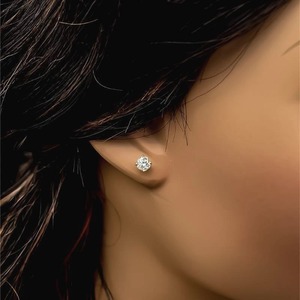 Diamond Stud Earring .52 carat Classic Round 14k Yellow Gold 4-Prong Setting. A must have for anyones jewelry collection.