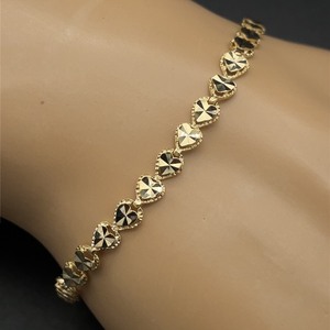 Shimmering and Sweet Diamond-Cut Heart Link Bracelet in 14k Yellow Gold. Graceful for Everyday.