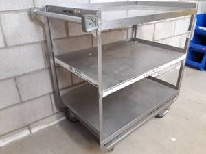 lot 25 image: MSRP $1200 LAKESIDE IMPERIAL CARTS Model 744&nbspHeavy DutyStainless Steel &nbsp3 Shelf Utility CartWith Large Casters for Easy Rolling 700LB Capacity - Great Condition