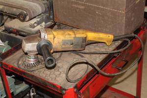 lot 81 image: DeWalt DW474 7 Angle Grinder