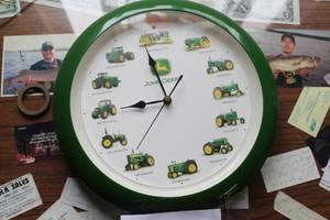 lot 227 image: John Deere Battery Powered Wall Clock with Tractor Sounds