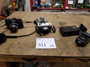 lot 511 image: Canon FT 35mm Film Camera with Lens, Canon G-III QL 35mm Film Camera with Lens, Minolta Auto 28 Flash Unit