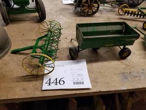 lot 446 image: Lot of (2) John Deere Toy Tractor Implements - Wagon, Hay Rake