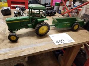 lot 449 image: John Deere Toy Tractor with Spreader