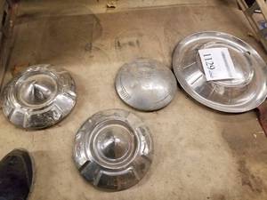 lot 1129 image: Lot of (4) Vintage Hub Caps - Dodge, Chevrolet