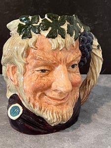 lot 25 image: Royal Doulton Bacchus Toby Mug
