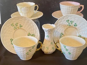 lot 61 image: Assortment of Belleek TeacupsSaucers and Small Vase