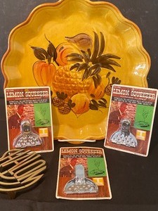 lot 106 image: Fun Colorful Vintage Platter, Shalom Trivet and Lemon Squeezers