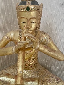 lot 270 image: Flute Playing Buddha Type Figurine