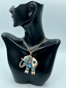 lot 312 image: Off Park Blue and Multi Colored White Enamel Rose Tone Elephant Figurine and Chain