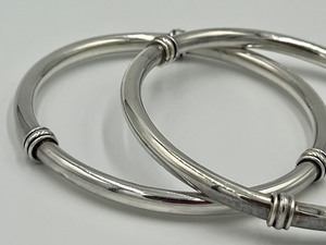 lot 326 image: Two Sterling Bangle Bracelets