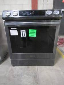 Samsung 6.3 cu. ft. Slide-In Electric Range with Air Fry Convection Oven in Fingerprint Resistant Black Stainless Steel, NE63T8711SG - NO RESERVE (Missing Knobs).