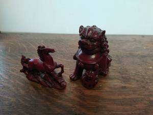 Two Oxblood Style Figurines