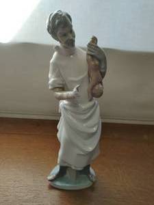 Lladro Obstetrician with Baby Figurine