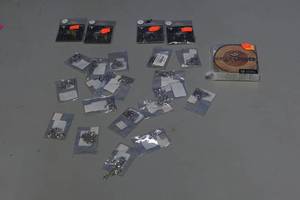 Jewelry Lot and coasters Necklaces are one Letter displays