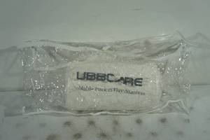 lot 73 image: NEW UbbCare Foldable Pack n Play Mattress