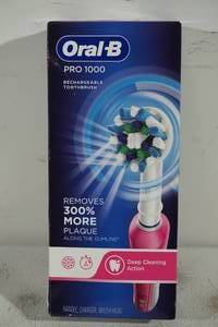 lot 50 image: NEW Oral-B Pro 1000 Rechargeable Toothbrush