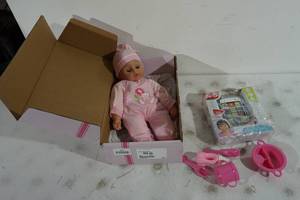 lot 268 image: NEW Baby Doll with Laugh and Learn Melody Player
