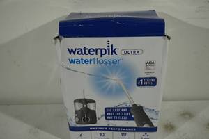 lot 220 image: NEW Waterpik Ultra Water Flosser