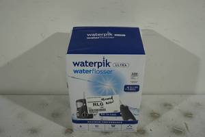 lot 221 image: NEW Waterpik Ultra Water Flosser
