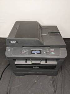 Brother DCP-7065DN Monochrome Laser Multi-Function Copier with Duplex Printing and Networking