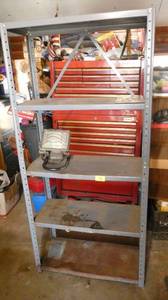Metal shelving unit with a work light
