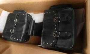 River Road leather saddle bags with damage