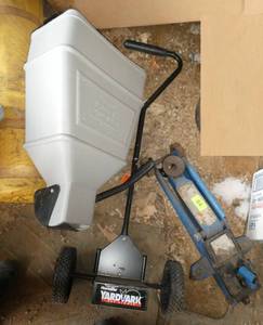 Dog food dispenser, car jack and small 2 wheel yard cart