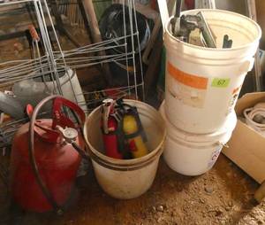 Buckets of grease guns, fire extinguishers, air tank
