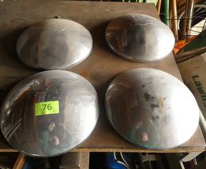 FOUR Moon hub caps, 2 Chevrolet
