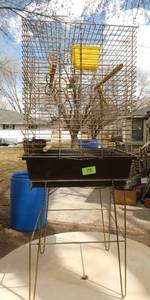 Large bird cage on stand