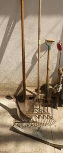 Shovel, potato fork, leaf rake and squeegee