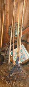3 leaf rakes, yard rake and rounded hoe