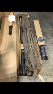 lot 22 image: Abba Patio 12 ft. x 9 ft. Aluminum Cantilever Patio Umbrella with Cross Base in Cocoa- good condition - review all pictures