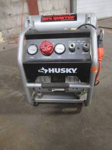 Husky 4.5 Gal. Portable Electric-Powered Silent Air Compressor, 3320445 - Works Great Includes Air Hose, Missing Handle.