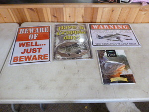 lot 285 image: 3 Metal Signs and Catfish Book