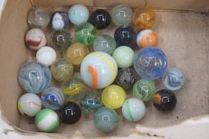 lot 31 image: glass marbles and shooters