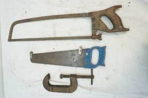 lot 64 image: meat saw, hand saw, c-clamp