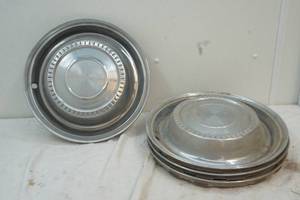 lot 111 image: vintage hub caps