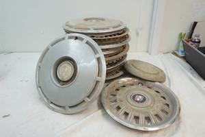 lot 123 image: mix and match vintage hub caps