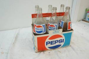 lot 153 image: vintage Pepsi bottles
