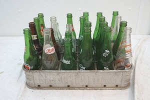lot 162 image: vintage soda bottle in Benson Bottling crate