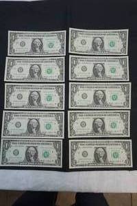 lot 226 image: dollar bills in a series