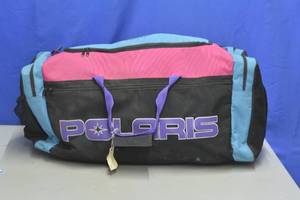 lot 79 image: Polaris duffle bag filled with items shown