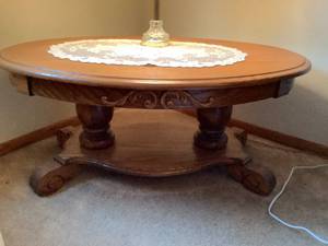 lot 202 image: Wooden Oval Coffee Table