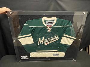 MN Wild 2015 team autographed jersey, professionally framed. NEW