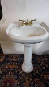 lot 13 image: White Porcelain Pedestal Sink with Brass Fixtures 20 x 15 x 36