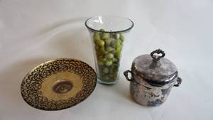 lot 20 image: Roger Co. Silver Inner-lined Ice Bucket with lid -Ornate glass pedestal Serving platter -Glass vase, full of pears