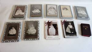 lot 75 image: Nine 5 x 7 notepads with vintage photo cover,  Pocket New Testament